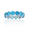 Blue Cubic Zirconia Eternity Band in Rhodium Plated Sterling Silver